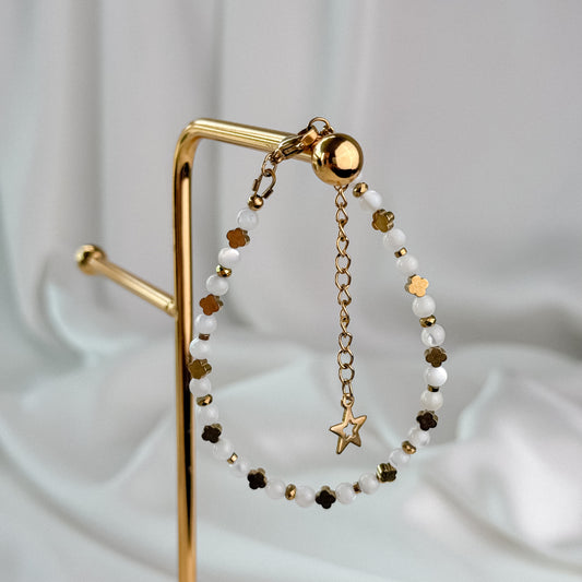White mother of pearl bracelet.
