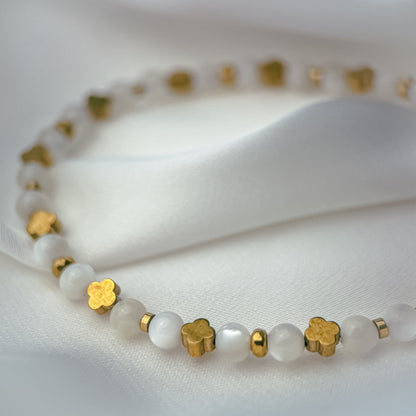 White mother of pearl bracelet.